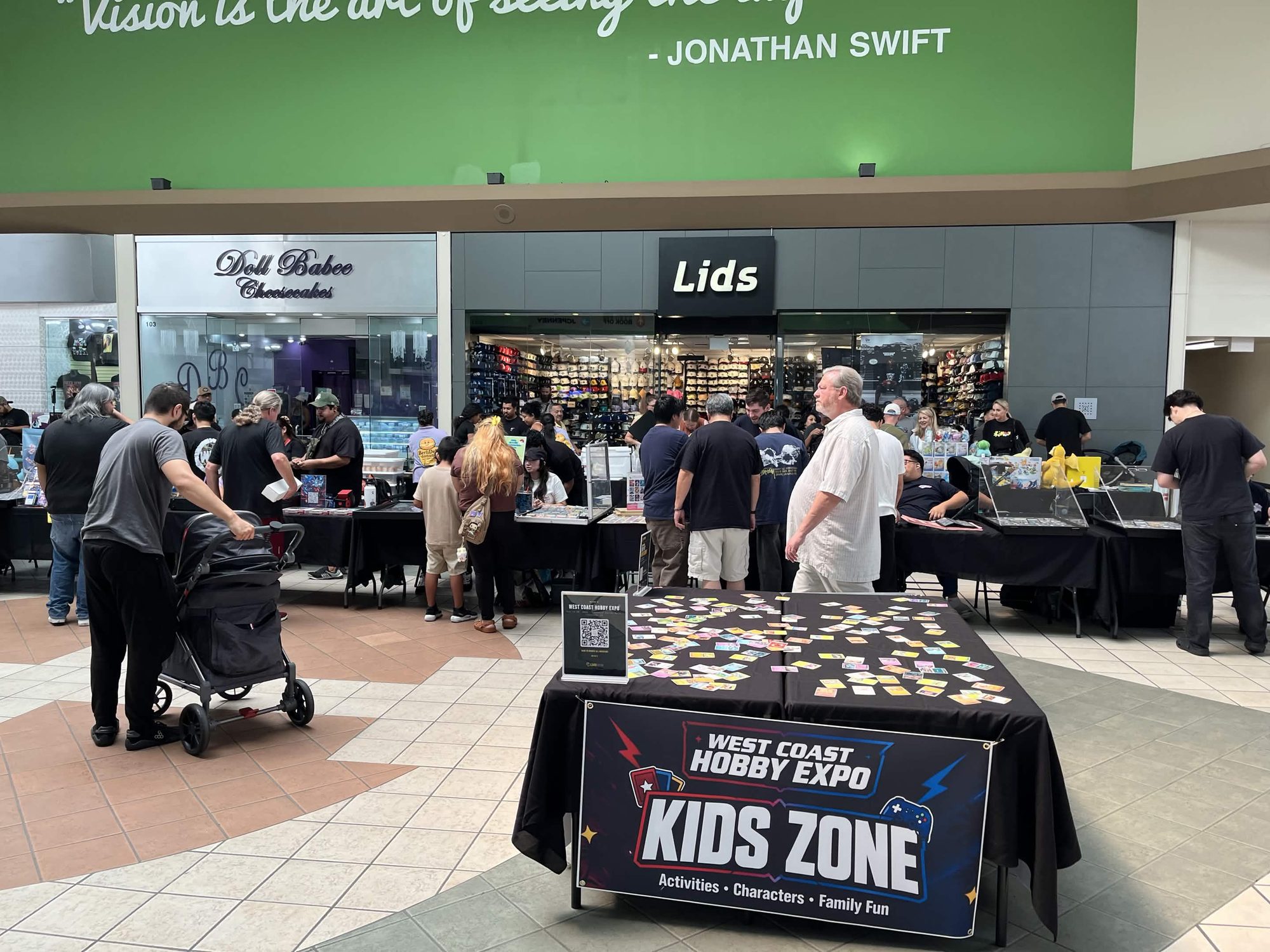 West Coast Hobby Expo Kids Zone with vendor tables in front of Lids